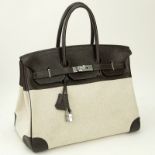 Hermès Togo Leather And Canvas Birkin Bag 35. Pallidum hardware, interior slot and zipper pockets.