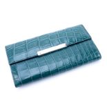 Gucci Green Matte Crocodile Continental Wallet. Leather interior. Credit card and slot pockets. Snap