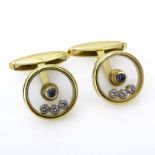 Chopard Happy Diamond 18 Karat Yellow Gold, .30 Carat Diamond and .30 Carat Sapphire Cufflinks.