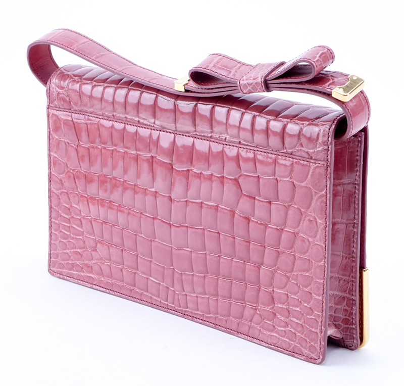 Prada Limited Edition Pink Crocodile Clutch. Gold tone hardware. Leather interior with zipper - Image 2 of 10