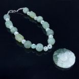 Collection of Two (2) 19/20th Century Chinese Jade Jewelry Items. Includes a beaded necklace with