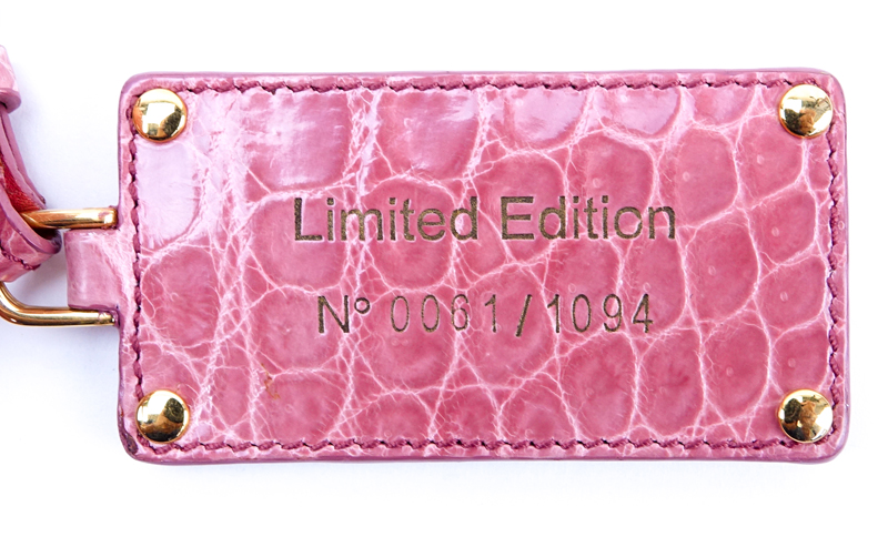 Prada Limited Edition Pink Crocodile Clutch. Gold tone hardware. Leather interior with zipper - Image 10 of 10