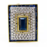 Sapphire, Diamond and 18 Karat Yellow Gold Brooch set in the Center with an Emerald Cut Sapphire