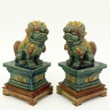 Pair Chinese Sancai Glaze Pottery Foo Dog Figures on Wood Bases. Unsigned. Small chips on one tail
