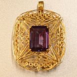 Vintage Emerald Cut Amethyst and 14 Karat Yellow Gold Filigree Pendant Brooch. Amethyst measures