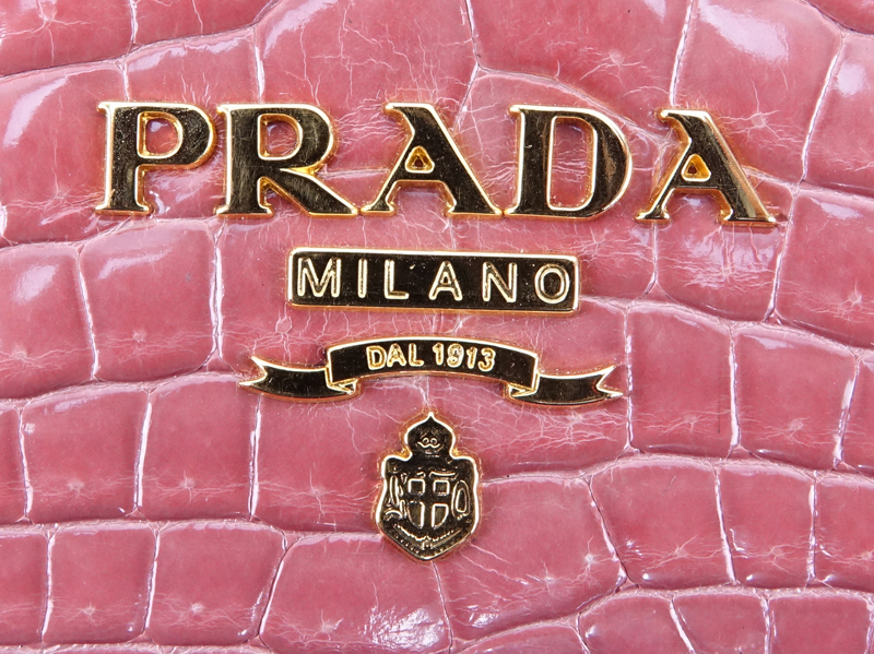 Prada Limited Edition Pink Crocodile Clutch. Gold tone hardware. Leather interior with zipper - Image 6 of 10