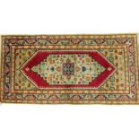 Semi-Antique Persian Rug. Some discoloration, wear to fringes and edges, dirty. Measures 75" H x 36"