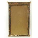 Early 20th Century Italian Louis XVI Style Giltwood Mirror. Carved scroll motif on apron with two