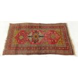 Semi-Antique Persian Khamseh Rug. Some discoloration, wear to fringes and edges, minor stains.