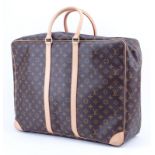 Louis Vuitton Sirius 55 Soft Sided Luggage. Monogram canvas, natural cowhide trim, washable canvas