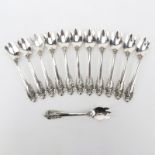 Set of Twelve (12) Wallace "Grand Baroque" Sterling Silver Ice Cream Forks. Circa 1941. Stamped