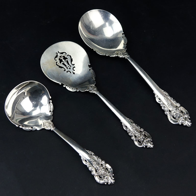 Collection of Three (3) Wallace "Grand Baroque" Sterling Silver Serving Spoons. Includes: tomato
