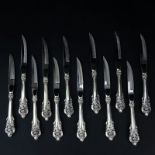 Set of Twelve (12) Wallace "Grand Baroque" Sterling Silver Beveled Steak Knives. Circa 1941. Stamped