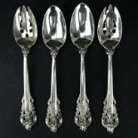 Collection of Four (4) Wallace "Grand Baroque" Sterling Silver Serving Spoons. Includes: two pierced