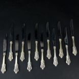 Set of Twelve (12) Wallace "Grand Baroque" Sterling Silver Knives. Circa 1941. Stamped appropriately