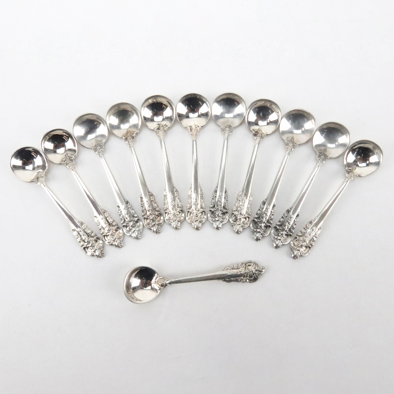 Set of Twelve (12) Wallace "Grand Baroque" Sterling Silver Salt Spoons. Circa 1941. Stamped