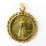US Standing Liberty $5 Gold Coin Pendant with 14 Karat Yellow Gold Bezel. Good condition. Please