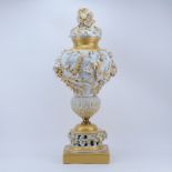 Very Large Mangani Italian Porcelain Covered Urn With Applied Flowers. Reticulated base, gilt