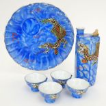 Six (6) Piece Vintage Japanese Blue Dragonware Sake Set. Includes: bottle 5-3/4" H, 4 whistler cups,