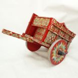 Vintage Painted Wood Pony Cart. Unsigned. Rubbing, small losses. Measures 25" H, 54" L. Shipping: