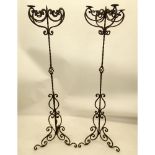 Pair Antique Italian Wrought Iron Torchieres. Unsigned. Good condition. Measures 73" H X 23" W at