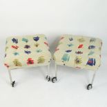 Pair of Mid Century Modern Rolling Chrome Upholstered Ottomans. Unsigned. Minor scuffs from use,