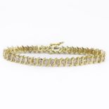 Vintage Approx. 4.30 Carat Round Brilliant Cut Diamond and 14 Karat Yellow Gold Tennis Bracelet.