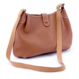 Hermes Brown Leather Cross Body Hobo Bag. Canvas strap, unlined, snap closure with perorated H