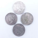 Collection of Four (4) U.S. Peace Dollars. Designer marks on all, mint marks on all except one.