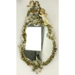 Antique Dresden Style Figural Porcelain Mirror. Decorated with putti and flowers. Unsigned.