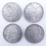 Collection of Four (4) U.S. Morgan Silver Dollars. Dates range from 1896-1899. Mintmark "O" on one