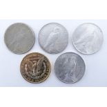 Collection of Five (5) U.S. Silver Dollars. Includes four Peace dollars and one Morgan silver