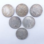 Collection of Six (6) U.S. Peace Silver Dollars. All dated 1922. All have designer initials, four