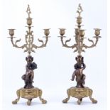 Two Antique style Italian Bronze Figural Candelabra. One with Five (5) Lights, One with three (3)