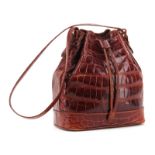 Lana Marks Russet Crocodile Drawstring Bucket Bag. Suede Interior with zipper pocket. Marked Lana Of