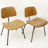 Pair Mid Century Eames Molded Plywood Chairs With Metal Legs. Unsigned. Wear and rubbing. Measures