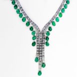 Contemporary Approx. 33.34 Carat Oval Cut Emerald, 14.02 Carat Baguette and Round Brilliant Cut