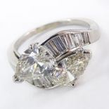 Vintage Approx. 3.69 Carat Diamond and Platinum Cross Over Ring. Set with a 1.47 carat and 1.22