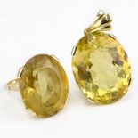 Large Oval Cut Yellow Citrine and 18 Karat Yellow Gold Ring and Pendant Suite. Ring Topaz measures