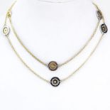 Vintage Bulgari 18 Karat Yellow Gold and Stainless Steel Tondo Sun Sautoir 36" Long Necklace.