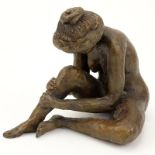 Modern Bronze Sculpture "Seated Woman". Signed E.M. Measures 5" H. Shipping $65.00 (estimate $100-$