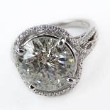 EGL Certified 5.36 Carat Round Brilliant Cut Diamond and 14 Karat White Gold Engagement Ring