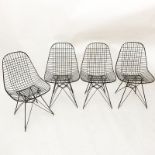 Four (4) Eames for Herman Miller Mid Century Wire Chairs. Black Metal with Eiffel Tower Base.