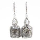 Diamond and 18 Karat White Gold Pendant Earrings. Stamped 750. Very good condition. Measure 1-7/8"