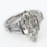 GIA Certified 3.09 Carat Marquise Cut Diamond and Platinum Engagement Ring accented with approx. 1.