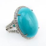 Contemporary Oval Cabochon Turquoise, 1.05 Carat Round Brilliant Cut Diamond and 18 Karat White Gold