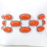 Approx. 5.85 Carat Diamond, Cabochon Red Coral and 18 Karat White Gold Bracelet. Stamped 18K. Very