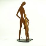 Val Robbins, American (1925-2009) Circa 1950's Carved walnut sculpture "Mother and Son With Hula