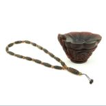 19/20th Chinese Carved Horn or Resin Libation Cup along with Tibetan Stoneware Beaded Prayer