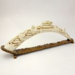 Vintage Chinese Faux Ivory Decorative Tusk Bridge On Stand. Unsigned. Wear to stand, repair.